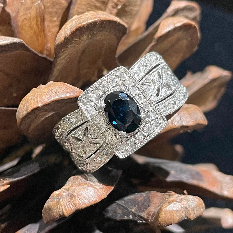 Reef knot rings-ESTATE 14K WHITE GOLD REGAL RING FEATURING OVAL BLUE SAPPHIRE WITH DIAMOND ACCENTS