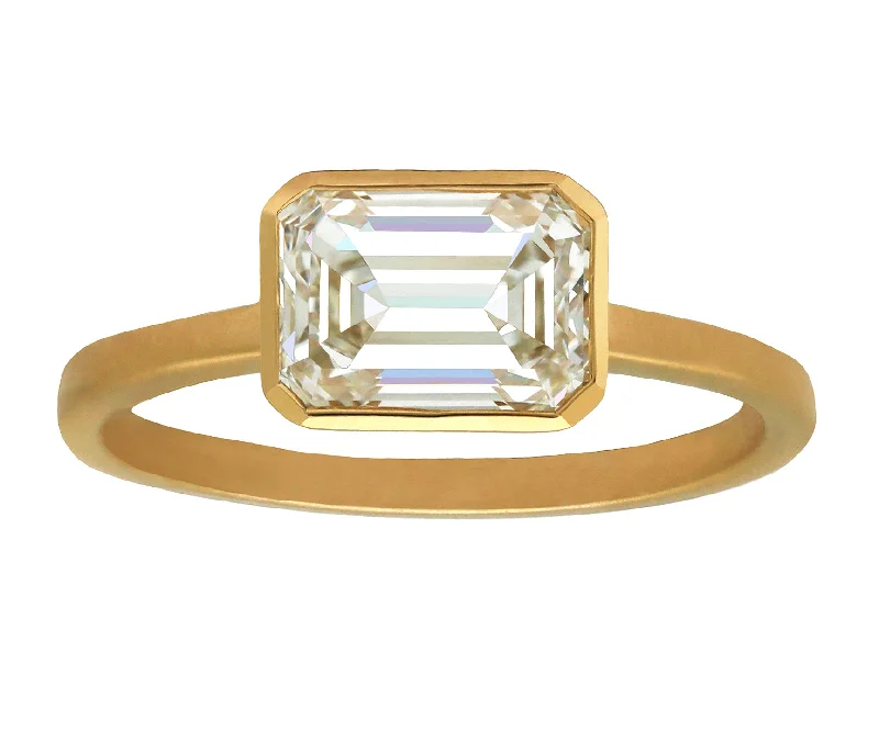 Elegant art rings-1.50ct Emerald Cut Diamond Set East-West in Gold Bezel Ring