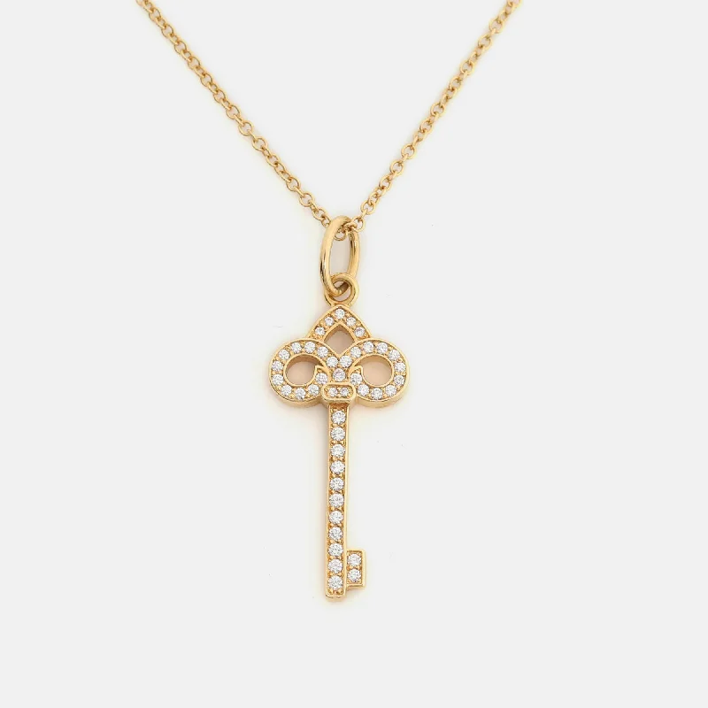 Citrine drop necklaces-Tiffany & Co. Fleur De Lis Key Diamond 18K Gold Necklace