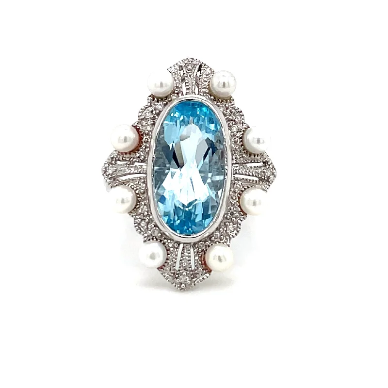 Java tile rings-ESTATE 14K WHITE GOLD BLUE TOPAZ AND PEARL COCKTAIL RING